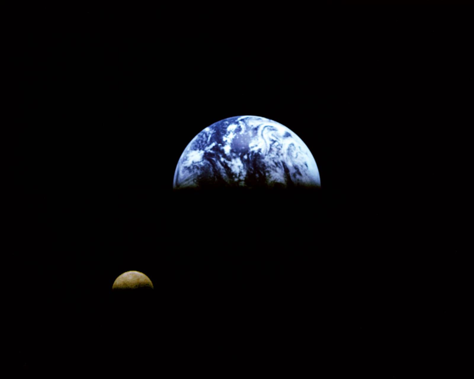 Galileo view of Moon orbiting the Earth taken from 3.9 million miles