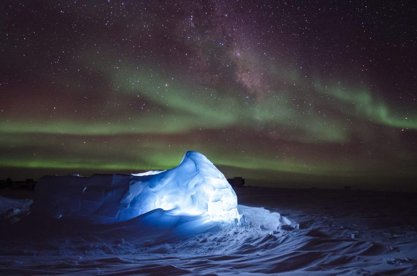 Polaris Australis — Aurora australis dancing over an LED illuminated igloo