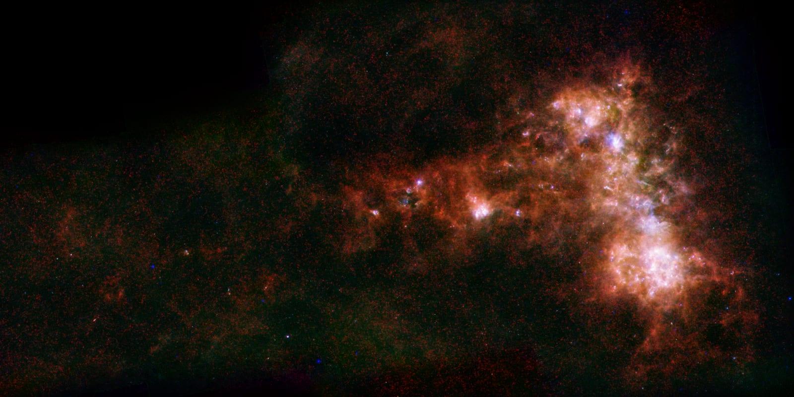 A Dwarf Galaxy Star Bar and Dusty Wing