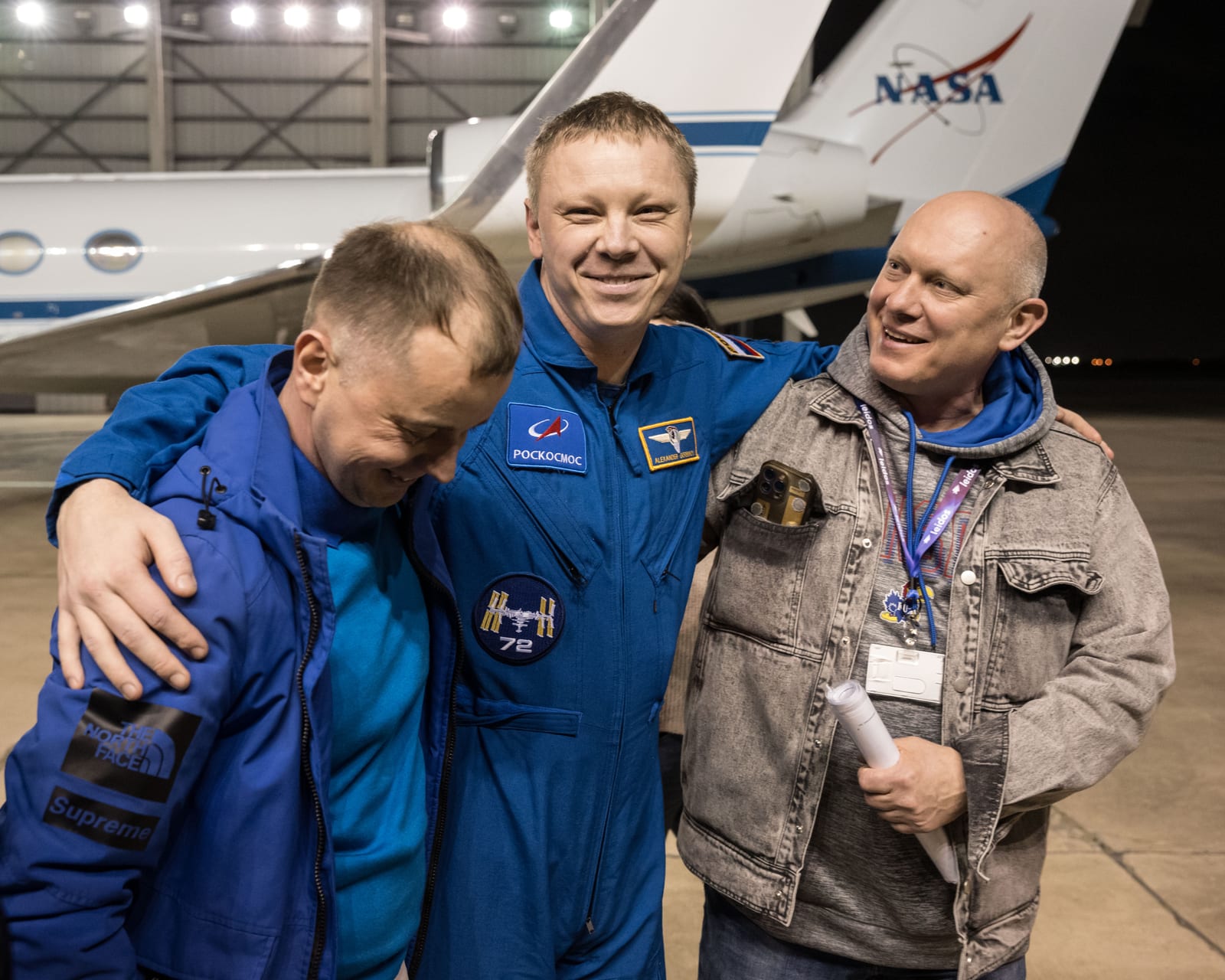 Roscosmos cosmonaut Aleksandr Gorbunov smiles as he returns to Johnson Space Center