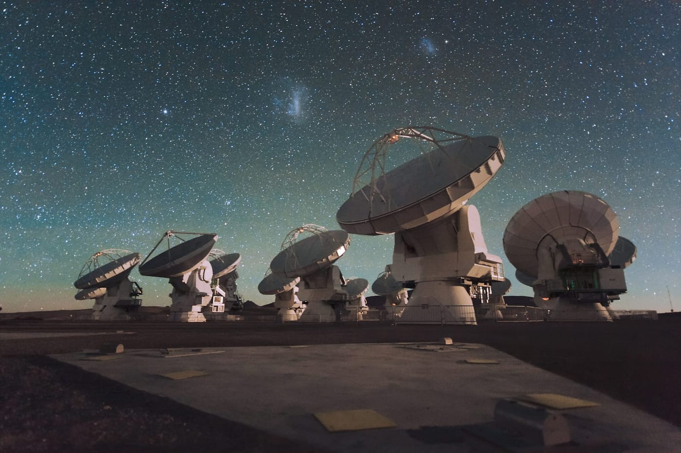 ALMA (Atacama Large Millimeter Array) — The Atacama Large Millimeter Array (ALMA) by night, under the Magellanic Clouds